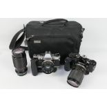 Photography - A Think Tank camera bag containing an Olympus OM2 with fitted OM-System 1:3.5 - 4.