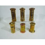 Six brass / copper and brass money banks in the form of Post Office pillar boxes,