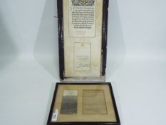 A framed memorial scroll,