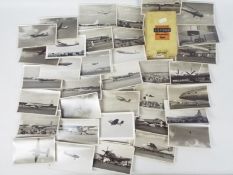 A collection of vintage aviation related photographs, some military related, in excess of 100.