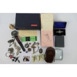 A mixed lot of collectables to include vintage autograph book, silver fob, bar brooch and necklace,