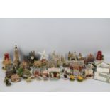 A collection of Lilliput Lane and similar models to include Big Ben, Buckingham Palace,