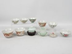 A collection of Chinese ceramics, predominantly bowls,