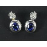 A pair of platinum, sapphire and diamond drop earrings, approximately 10.9 grams.