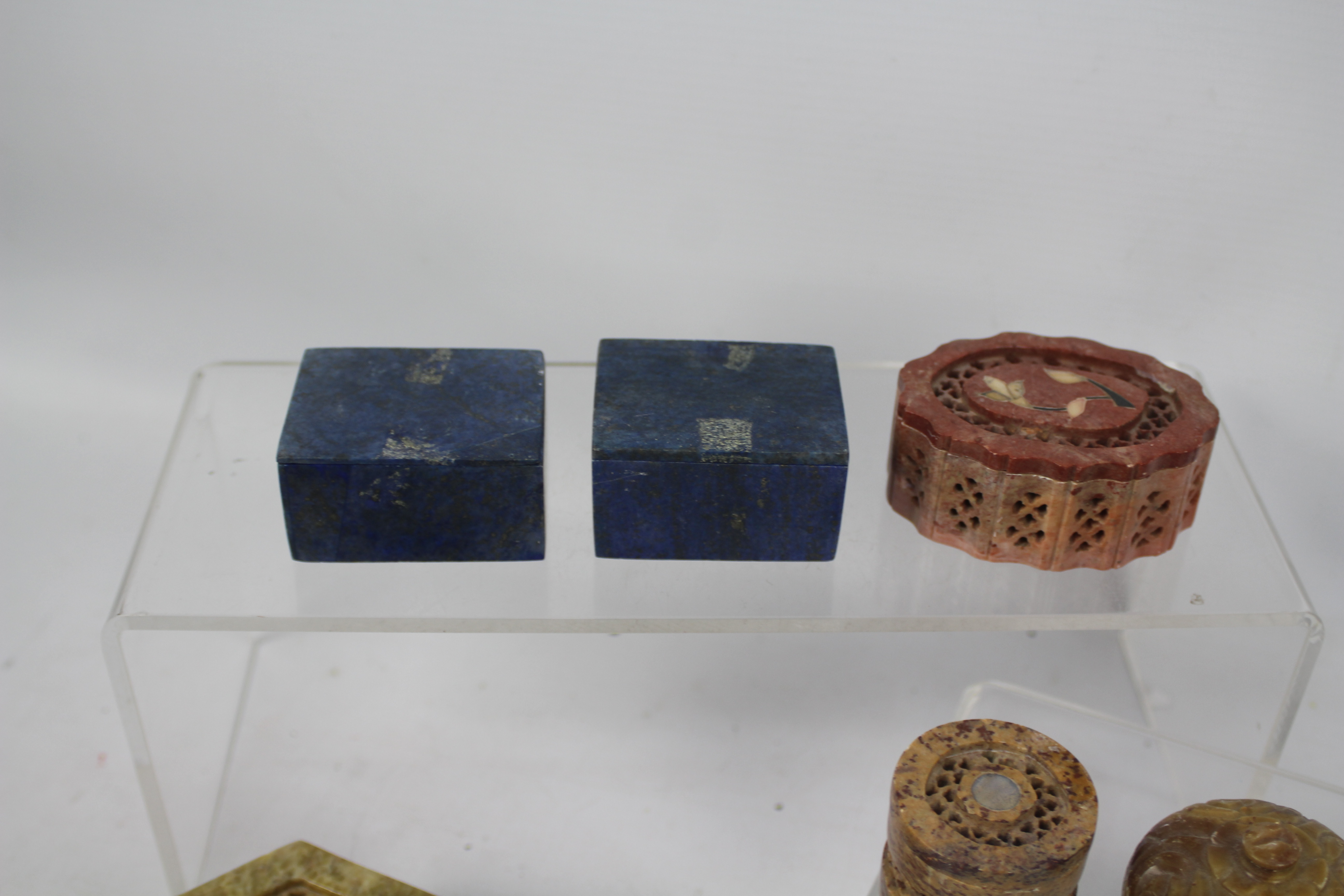 A collection of carved stone trinket boxes, largest approximately 3.5 cm x 7.5 cm. - Image 2 of 4