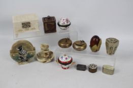 A collection of trinket boxes, pill boxes and similar to include a sterling silver pill box,