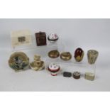 A collection of trinket boxes, pill boxes and similar to include a sterling silver pill box,