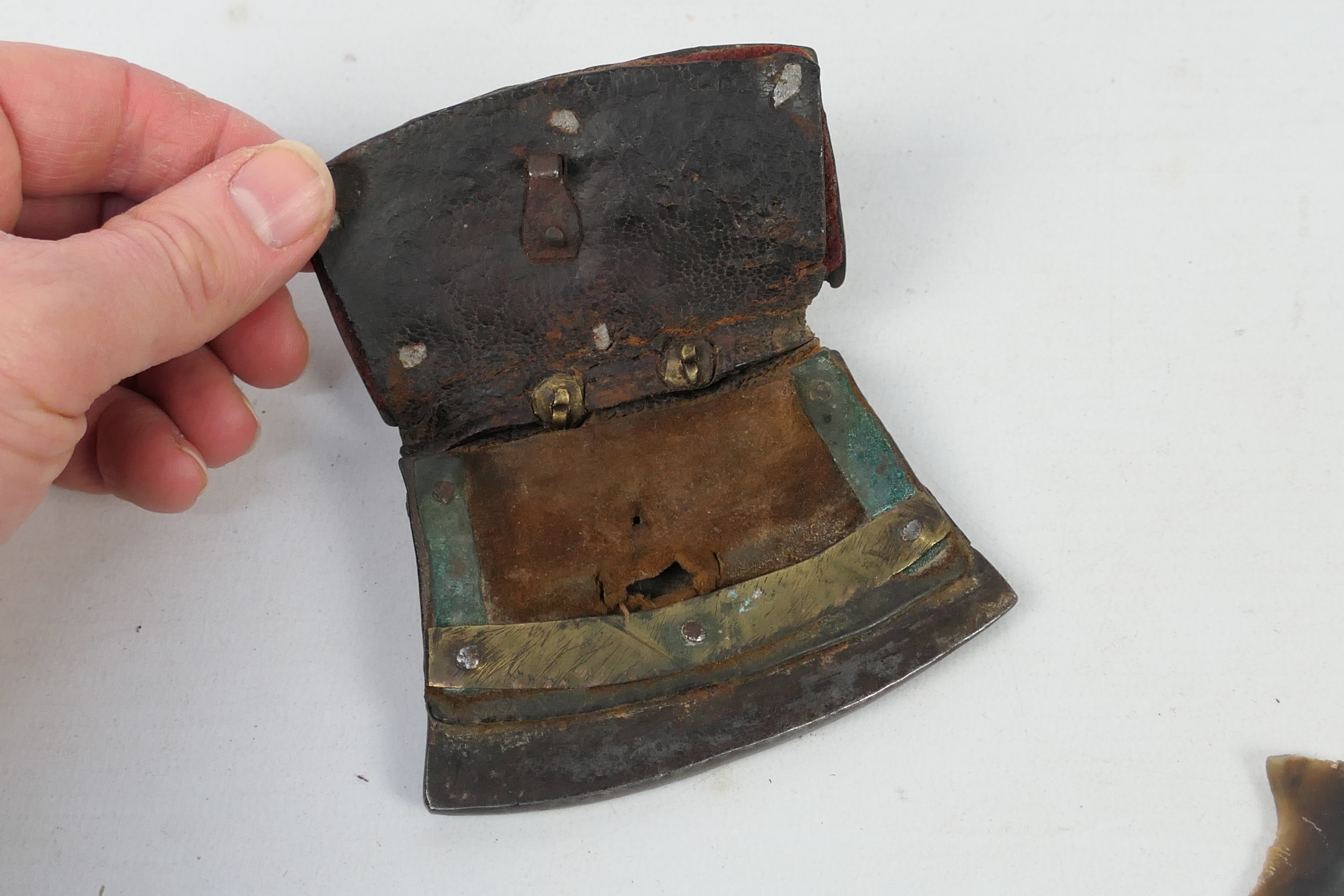 A 19th century Tibetan flint pouch with an arched flint iron to the base, - Image 4 of 4