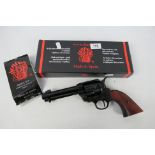 A replica / wall hanger cowboy 45 single action revolver in box.