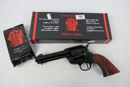 A replica / wall hanger cowboy 45 single action revolver in box.