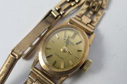 A lady's 9ct gold Rotary wrist watch on 9ct gold bracelet, 13 grams all in.