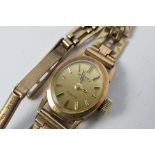 A lady's 9ct gold Rotary wrist watch on 9ct gold bracelet, 13 grams all in.