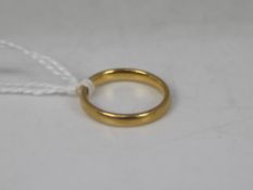 A 22ct gold wedding band, size G+½, approximately 2.7 grams all in.