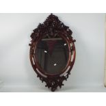 A good quality mahogany framed wall mirror,