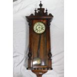 A Vienna style wall clock, walnut case with turned and applied decoration, glazed door,