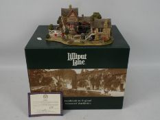 Lilliput Lane - A boxed British Collection model entitled Full Steam Ahead # L2365, with deeds.