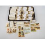 A quantity of cigarette and trade cards comprising Players, Gallaher, Carreras and similar,