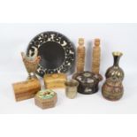 Lot to include a Satsuma covered box, a pair of carved wood candlesticks with napkin rings,