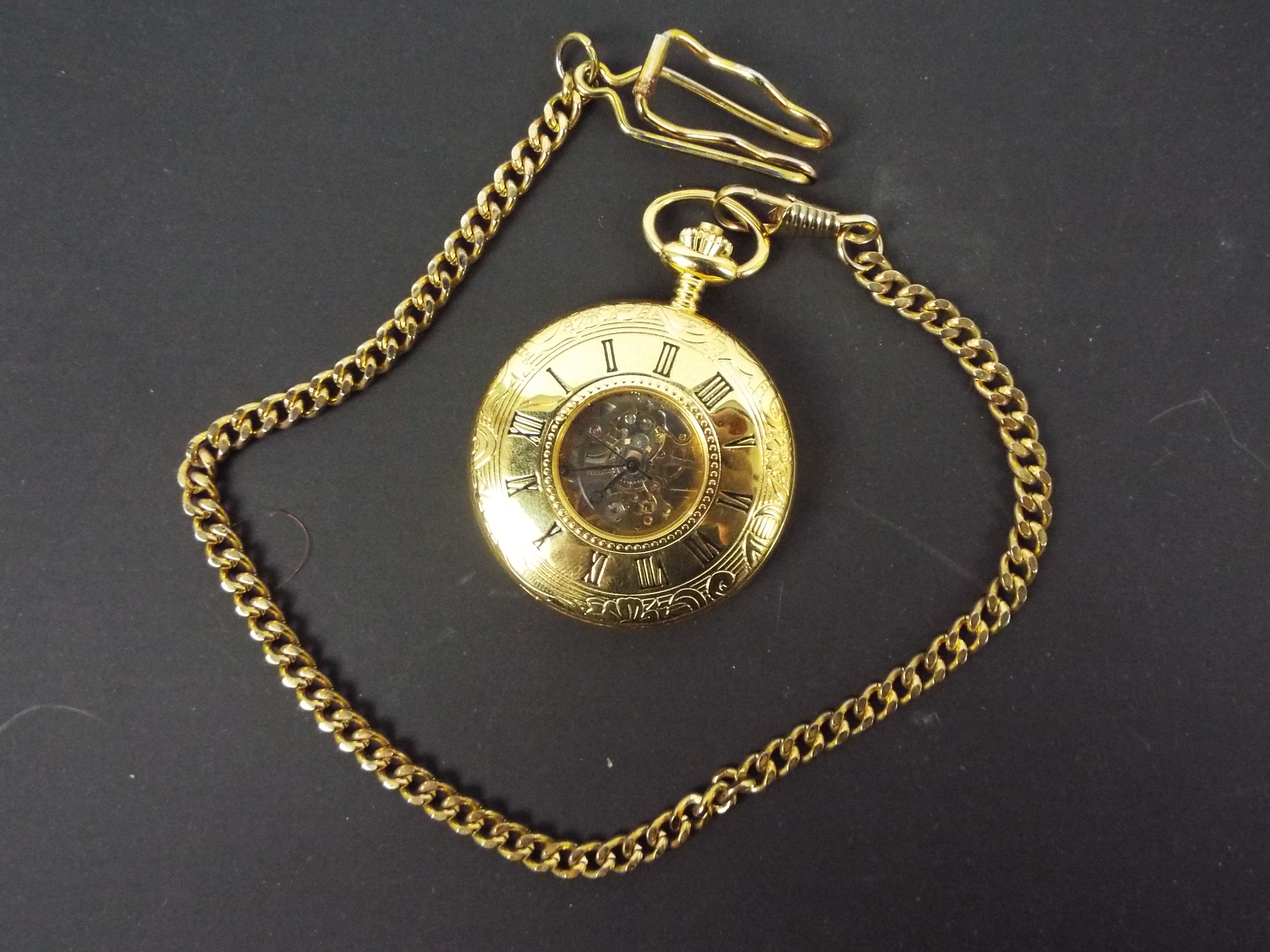 A modern, gold plated, half hunter, keyless wind pocket watch and chain by Rapport,