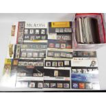 Philately - A quantity of Royal Mail mint stamp presentation packs, in excess of £80 face value.