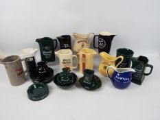 Breweriana - A collection of various water jugs, ashtrays and similar.