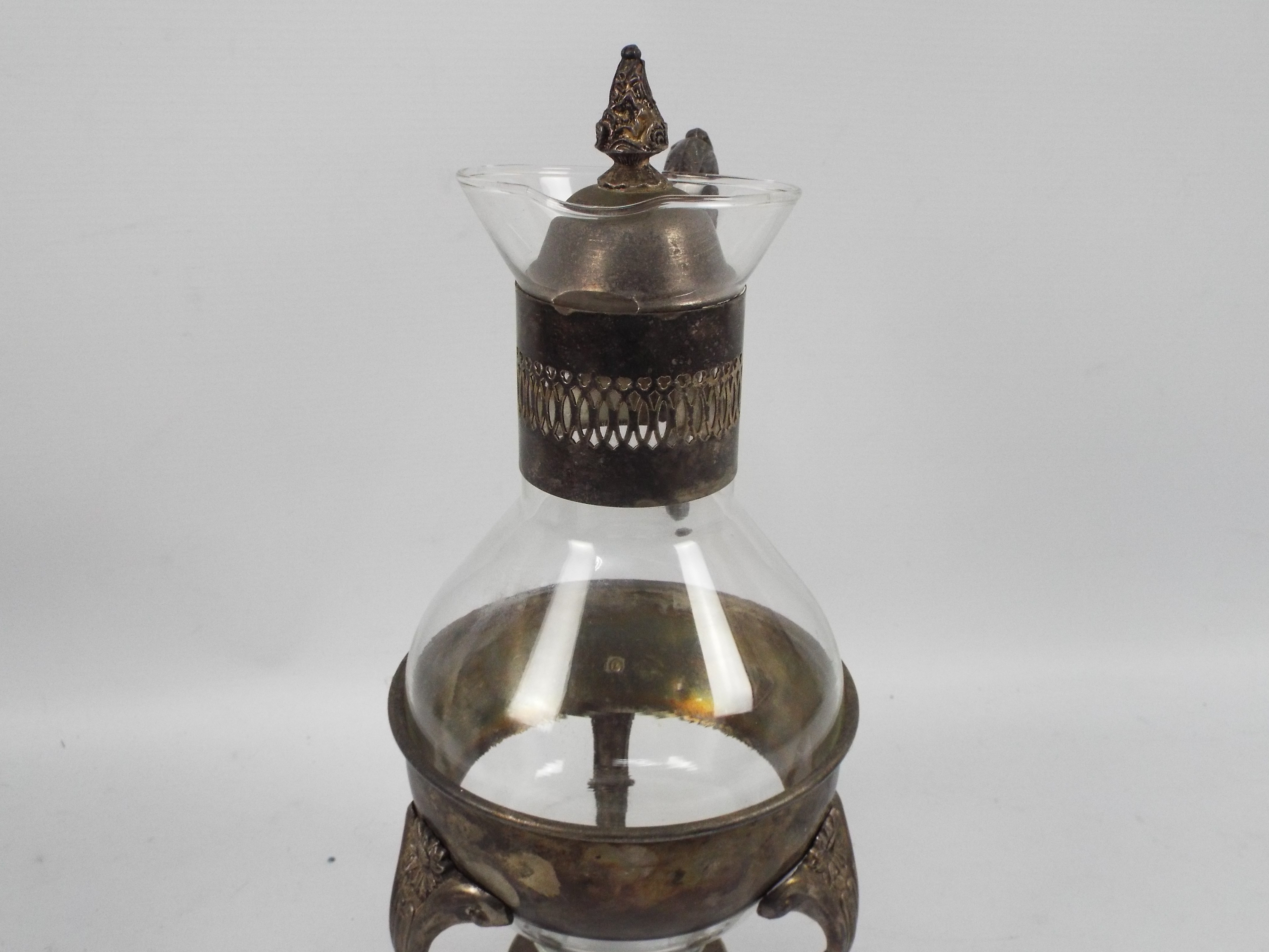 A glass and silver plate coffee pot with plated warming stand, approximately 35 cm (h). - Image 5 of 5