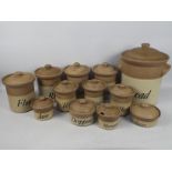 A collection of John Hermansen stoneware, kitchen storage jars, largest approximately 36 cm (h).