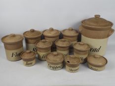 A collection of John Hermansen stoneware, kitchen storage jars, largest approximately 36 cm (h).