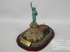 A Danbury Mint detailed replica of the Statue Of Liberty from the New York Landmarks collection,