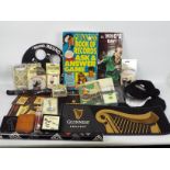 Guinness - A collection of Guinness branded collectables to include hats, coasters/ table mats,