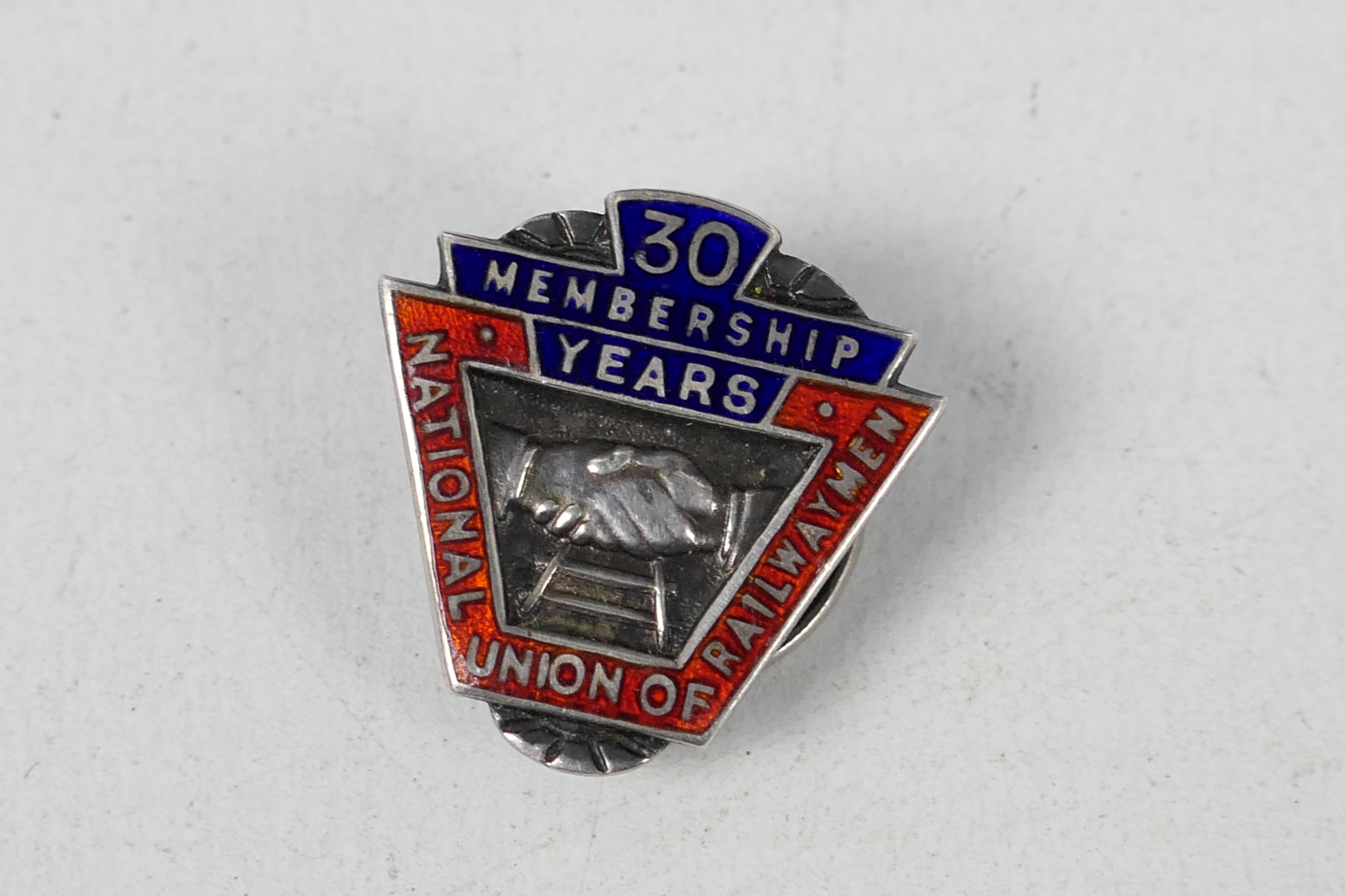 A vintage British Rail jacket with insignia and buttons and a hallmarked silver and enamel lapel - Image 7 of 7