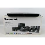 A boxed Panasonic Blu-ray Home Theatre Sound System, model SC - BTT405, unchecked for completeness.