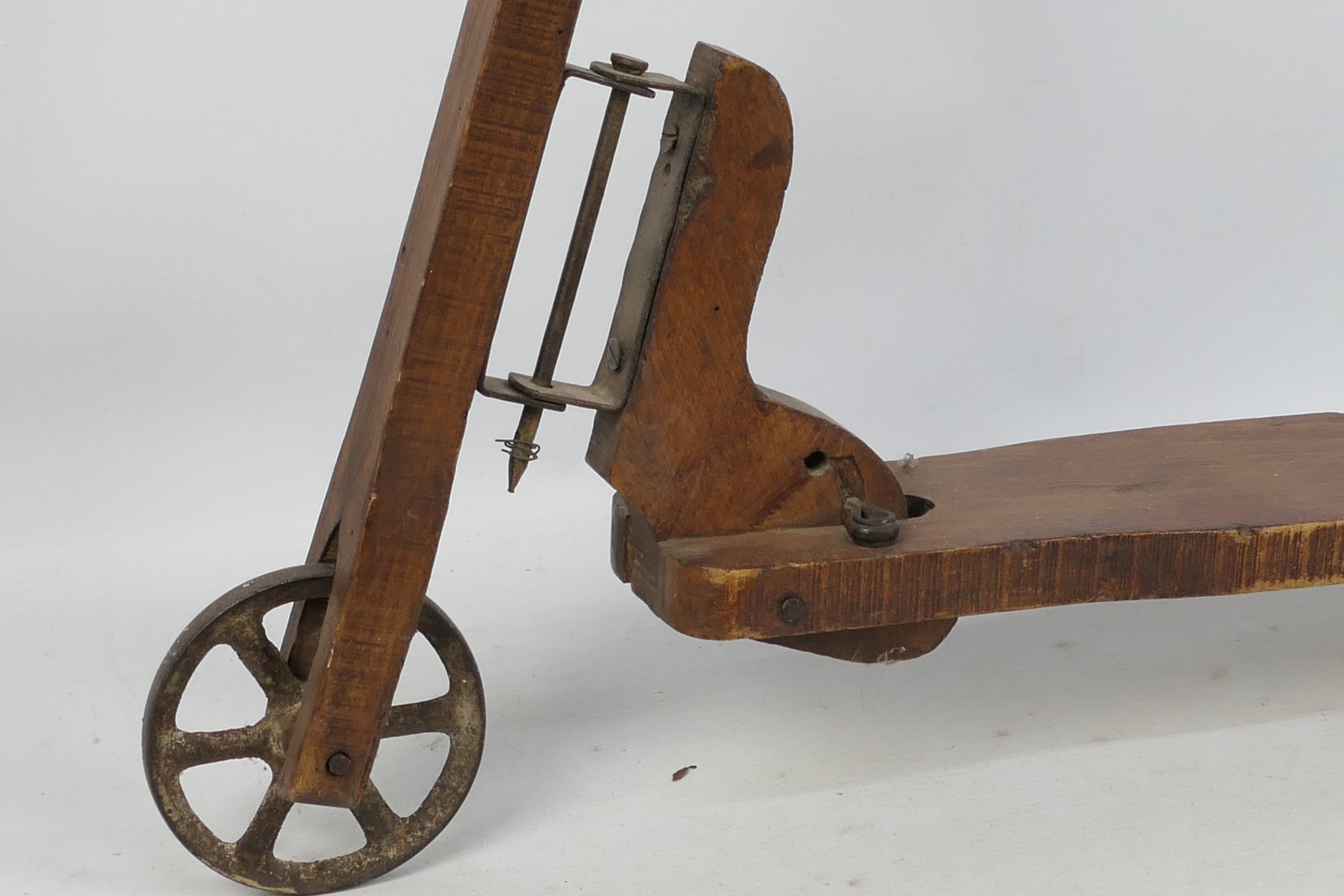 A vintage hand constructed wooden child's scooter with metal wheels, approximately 80 cm x 70 cm. - Image 3 of 5