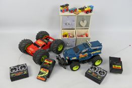 Tyco - Bigjigs - 2 x remote control trucks with chargers and a small wooden chest of drawers with a