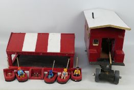 Two scratch built toys, consisting of a red and white wooden Romany Caravan,