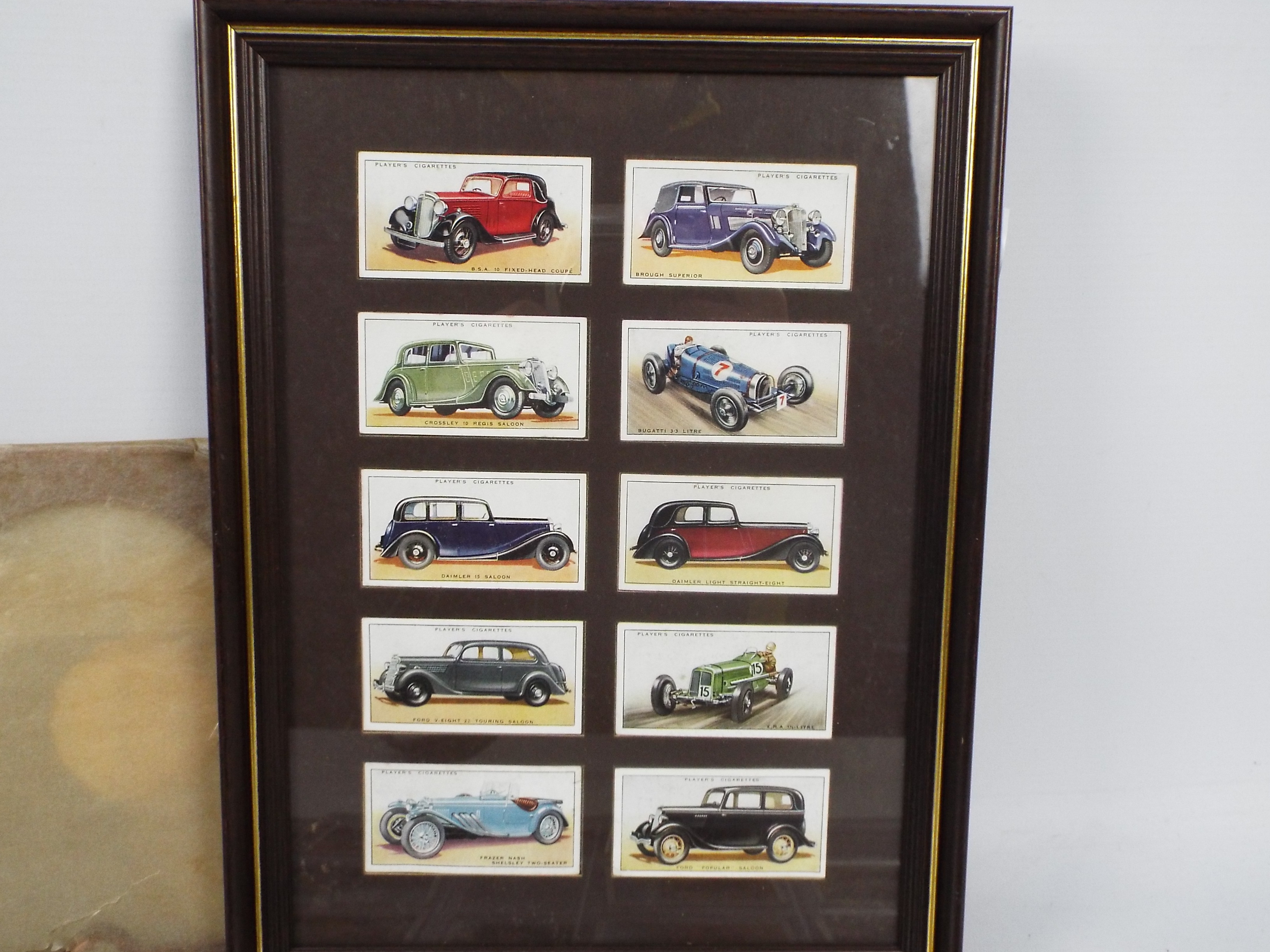 A framed cigarette card display of motor cars, - Image 2 of 7