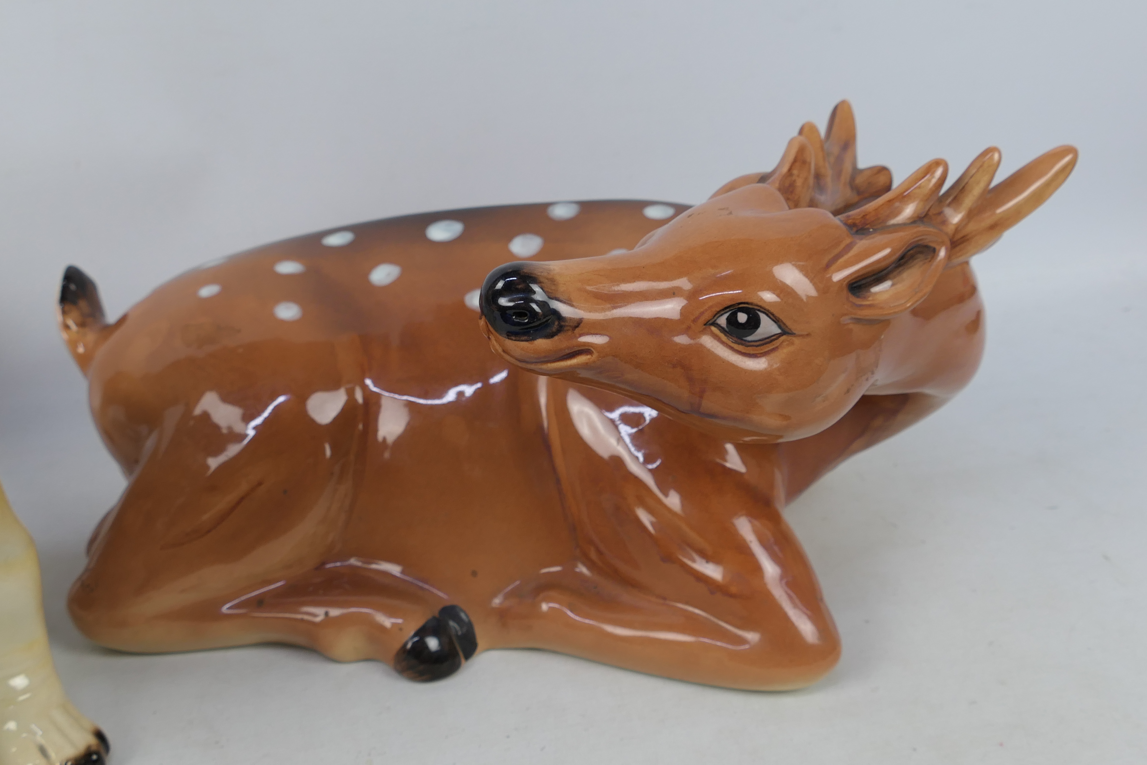 A large ceramic model of a deer, approximately 48 cm (l) and a model of a bulldog. - Image 4 of 5