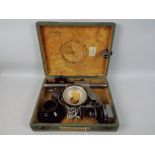 A vintage Soviet Russian portable photograph enlarger, contained in case.