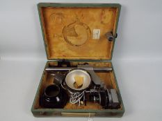 A vintage Soviet Russian portable photograph enlarger, contained in case.