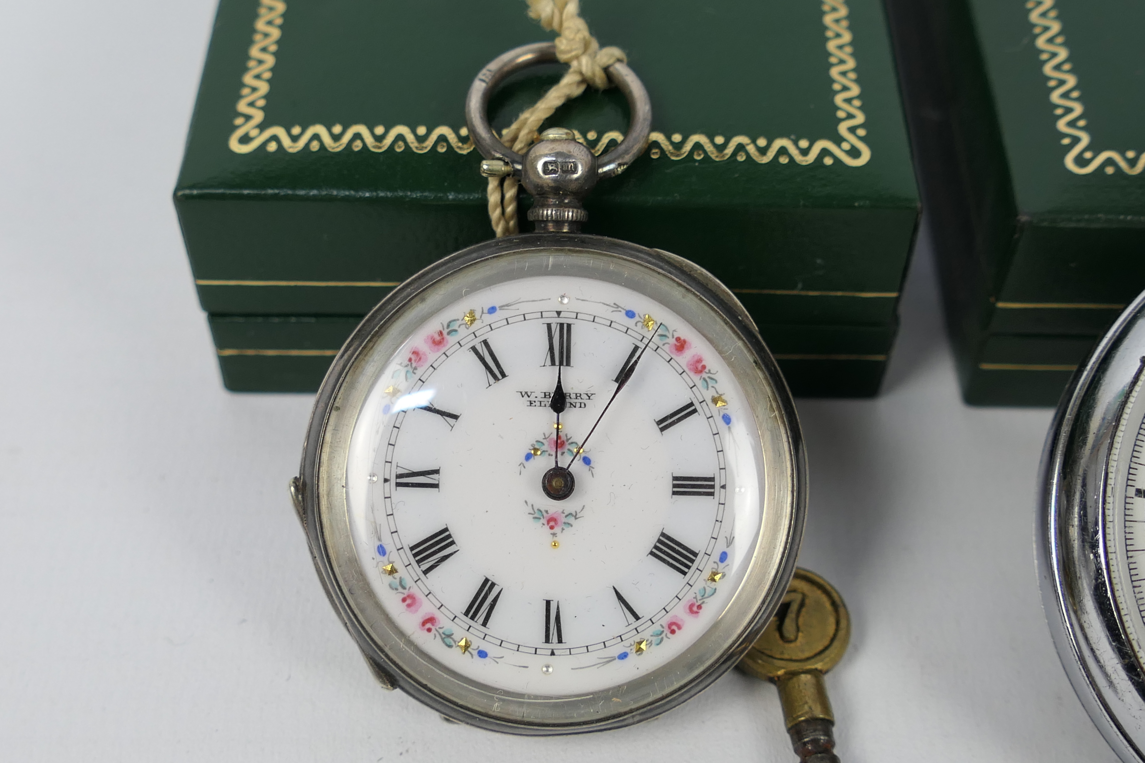 A silver cased, open face lady's pocket watch with Roman numerals to a white, - Image 2 of 6