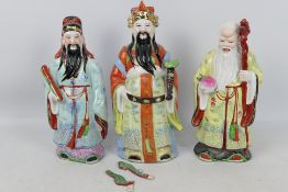 Sanxing - Three ceramic figures depicting the deities Fu, Lu and Shou,