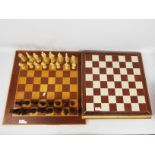 Two vintage chess boards and a set of chessmen with 10 cm (h) king.