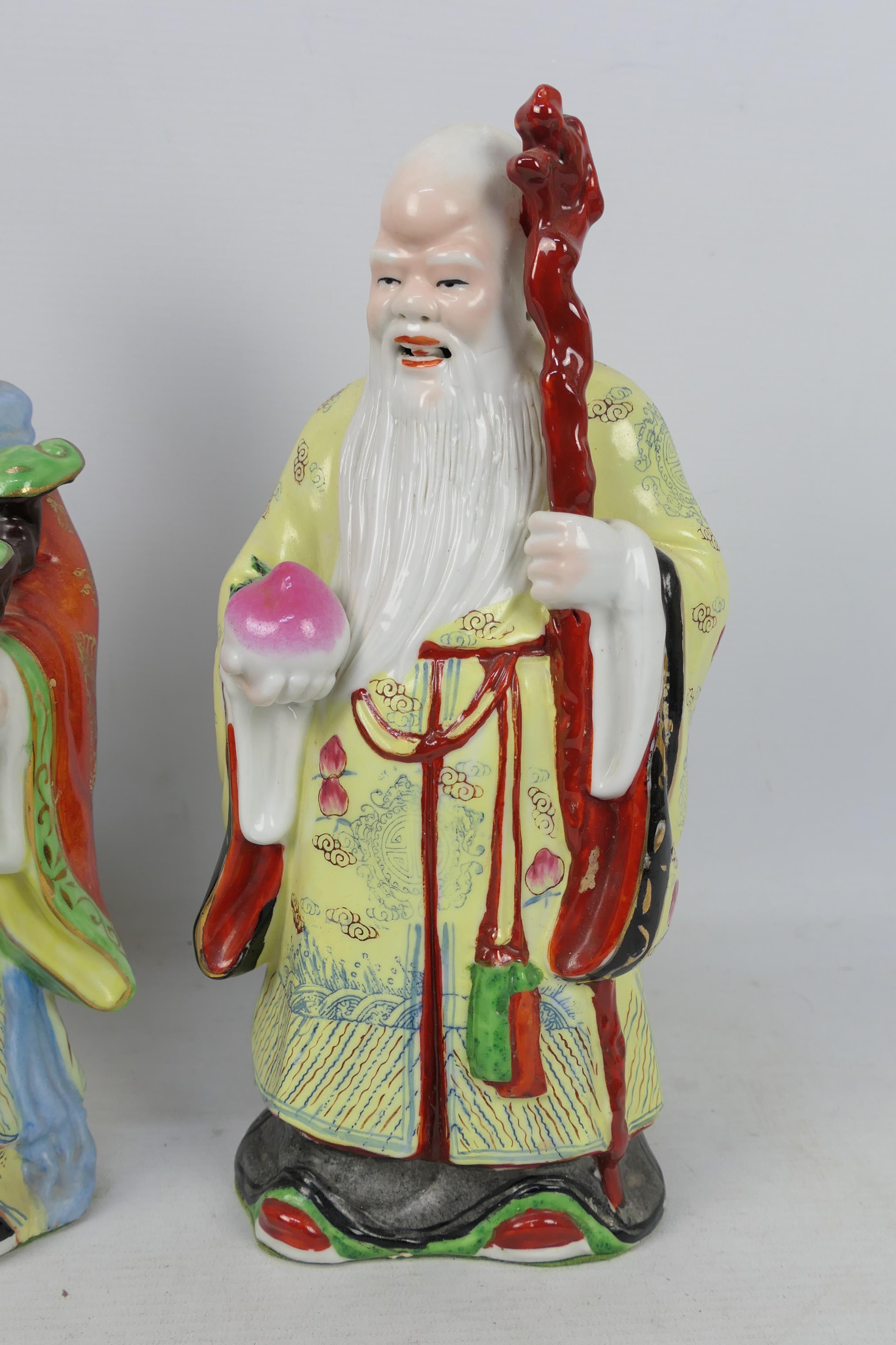 Sanxing - Three ceramic figures depicting the deities Fu, Lu and Shou, - Image 4 of 6