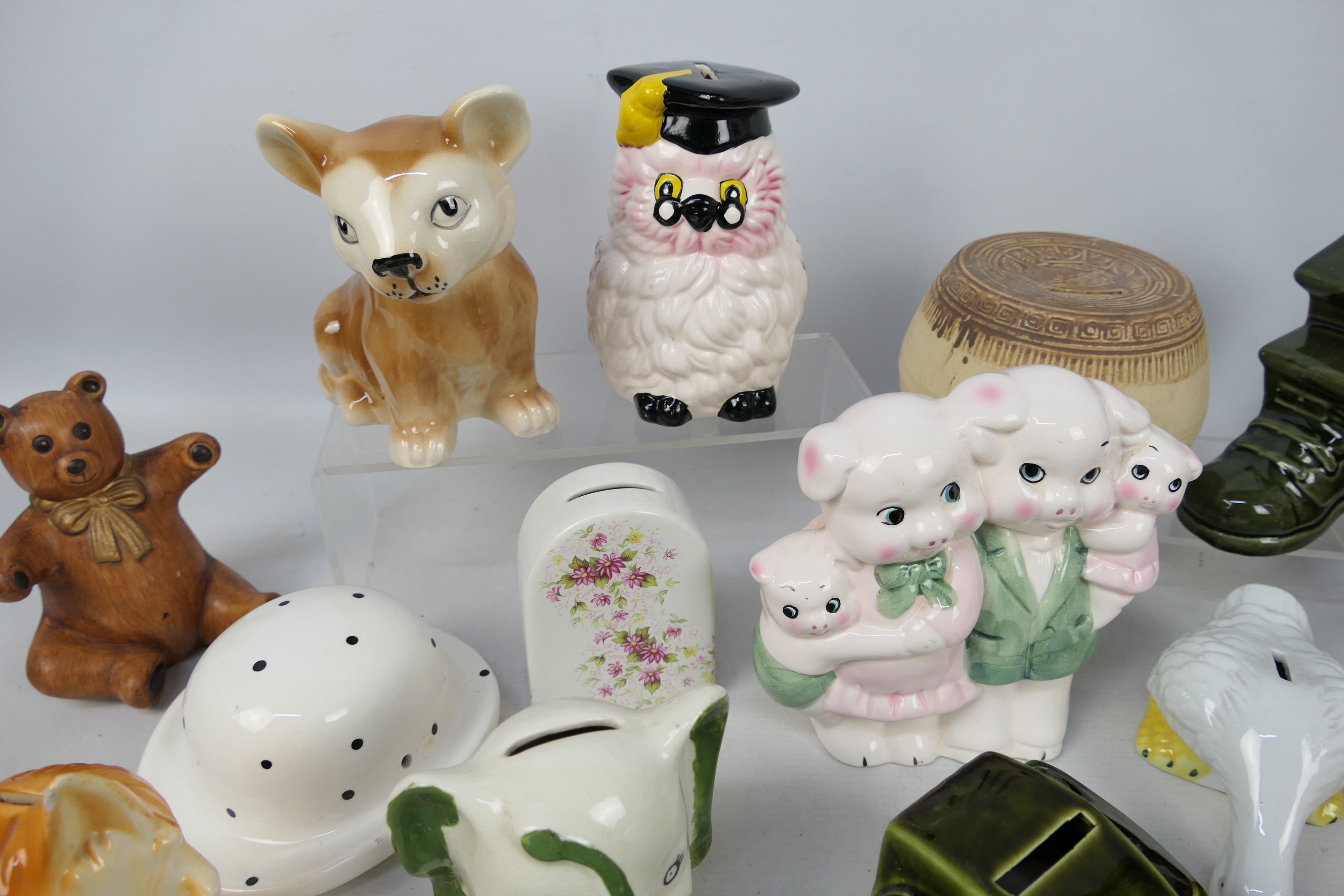 A collection of ceramic money banks. - Image 3 of 5