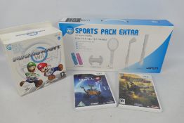 Wii - 2 x boxed Wii items and 2 x games - Lot includes a boxed Wii Sports Pack Extra set to include