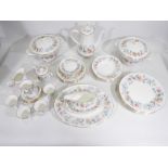 Wedgwood - A collection of dinner and tea wares in the Mist Rose pattern comprising dinner plates,