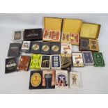 Guinness - A collection of Guinness branded playing cards including factory sealed examples.