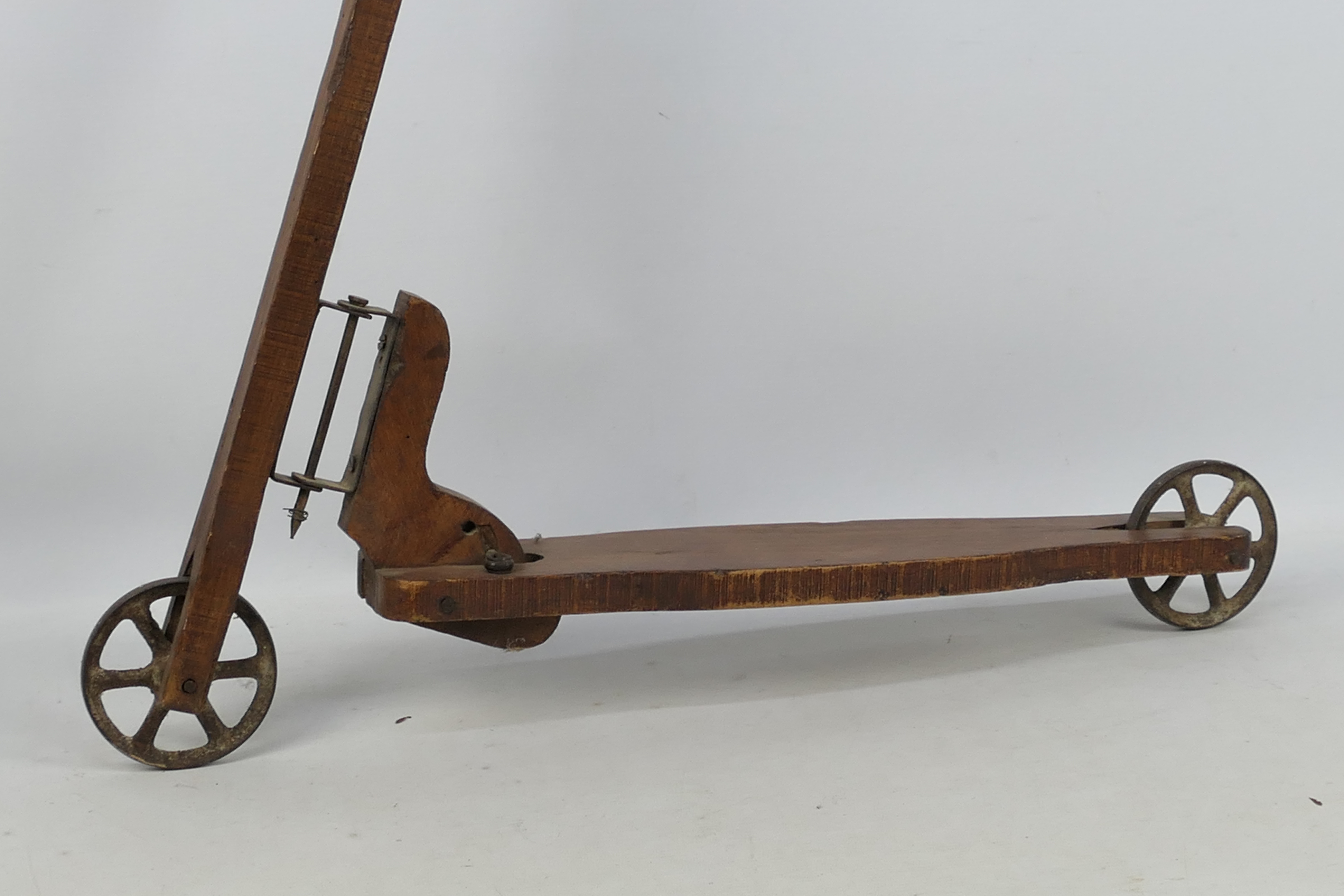 A vintage hand constructed wooden child's scooter with metal wheels, approximately 80 cm x 70 cm. - Image 2 of 5