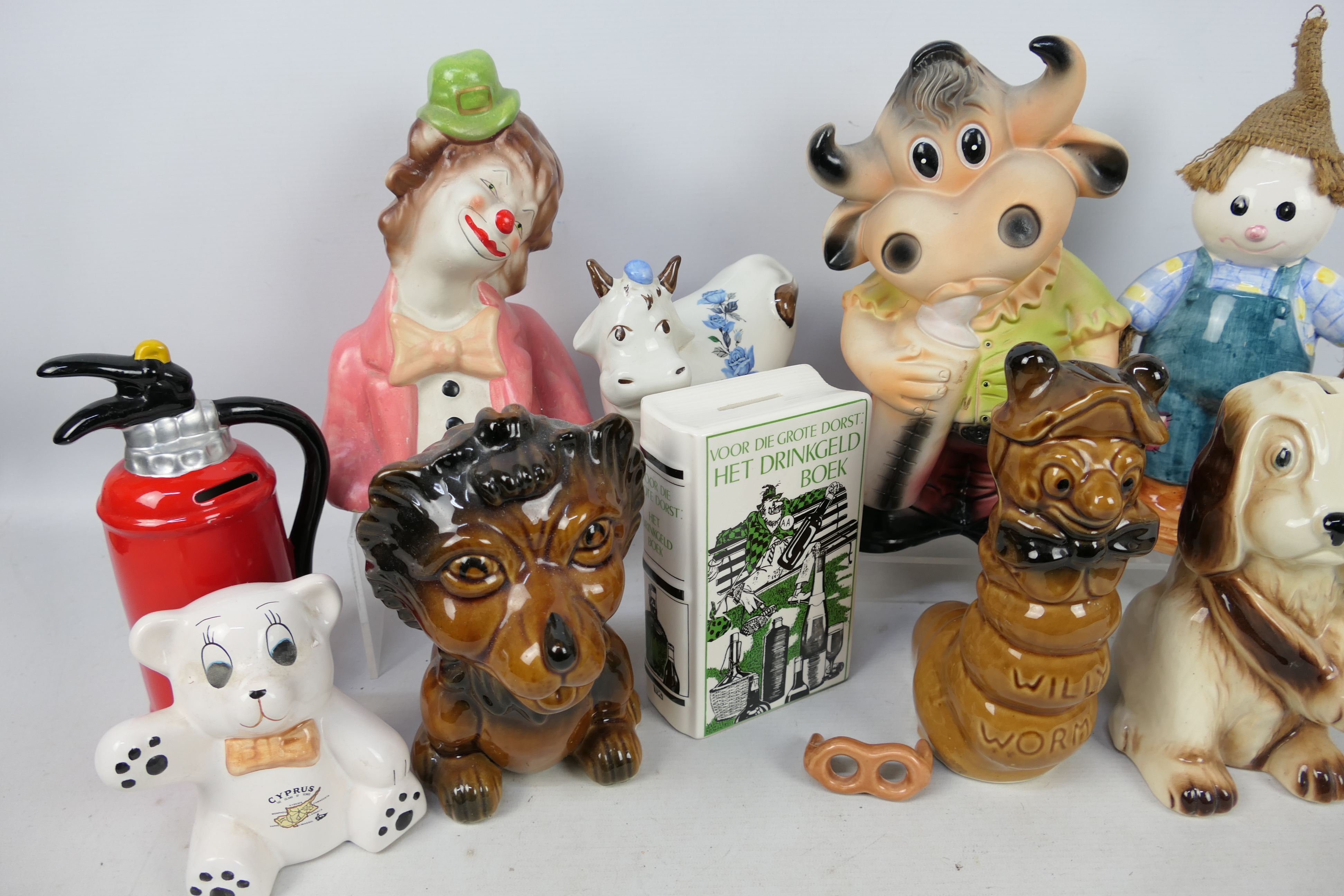 A collection of ceramic money banks. - Image 2 of 3