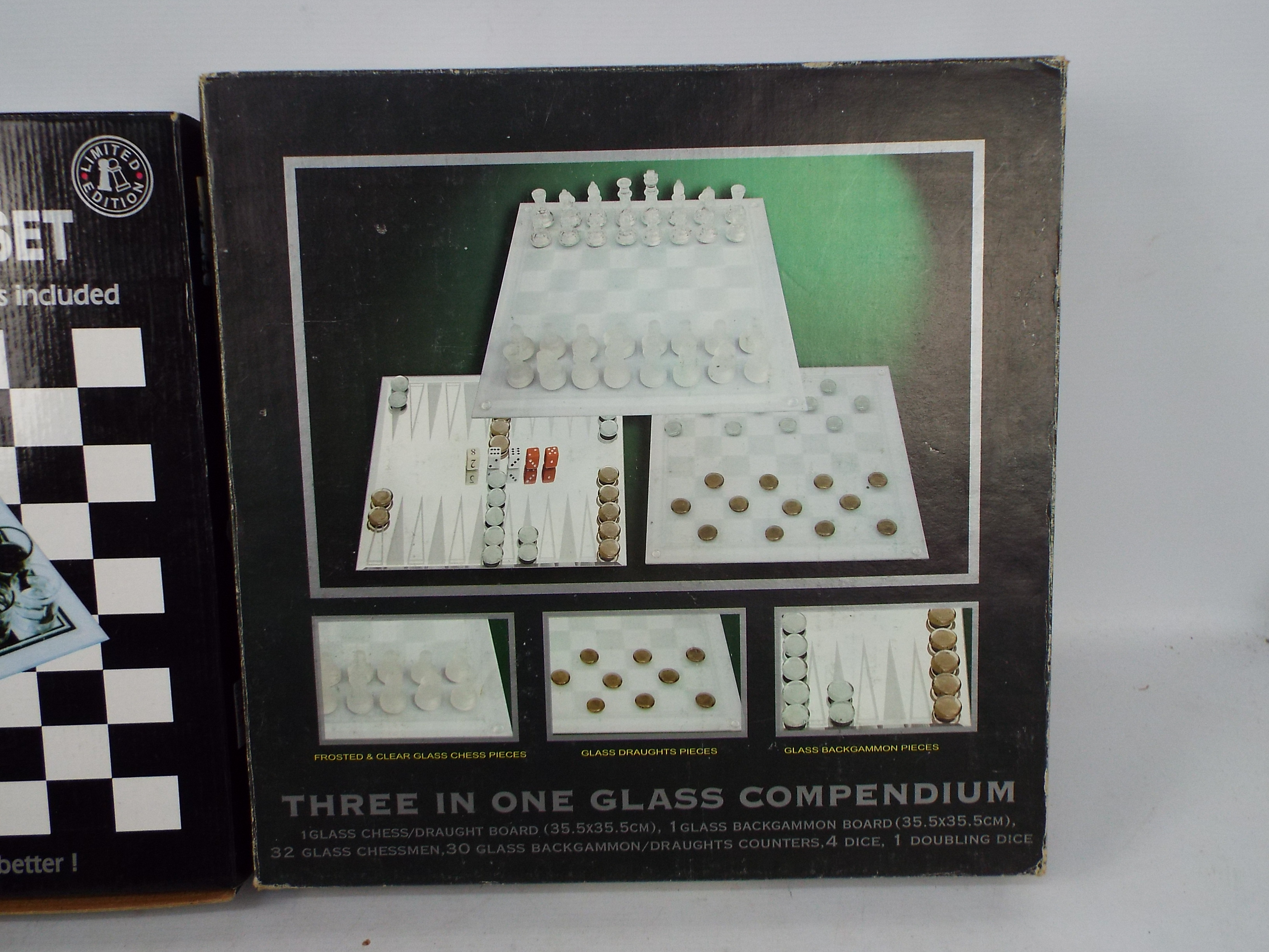 A 3 in 1 glass games compendium and a glass shot glass chess set, both boxed. - Image 3 of 3